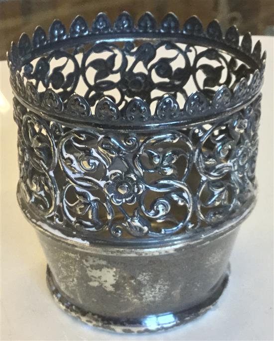 A silver cup cover